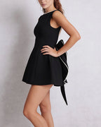 Vyla™ Elegant Pearl Trim Open Back Bow Mini Dress