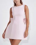 Vyla™ Elegant Pearl Trim Open Back Bow Mini Dress